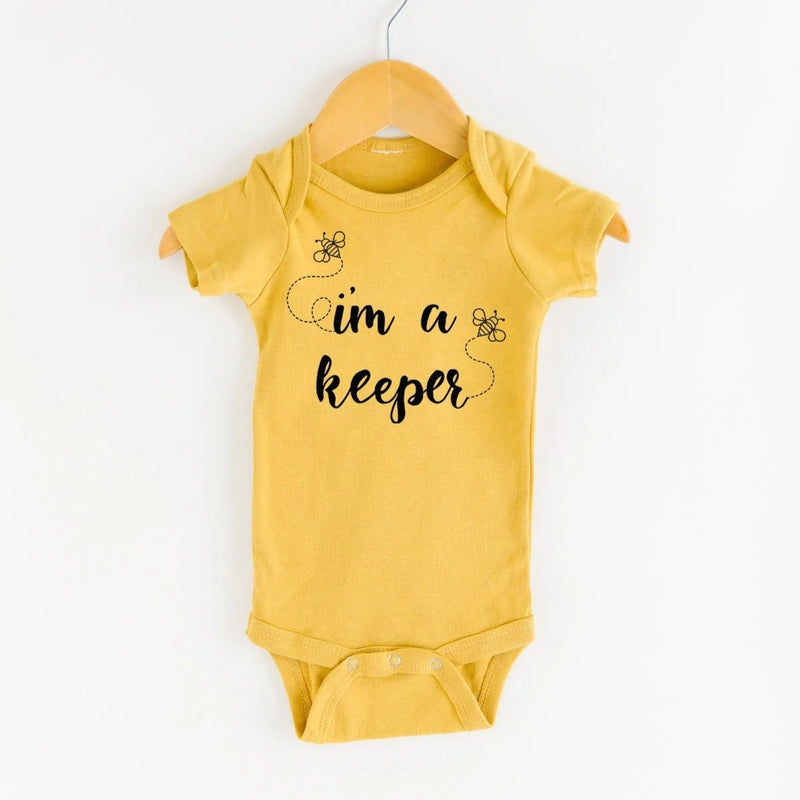 I'm a Keeper Mustard Onesie by Nature Supply Company